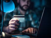 Worried man checking his bank account online